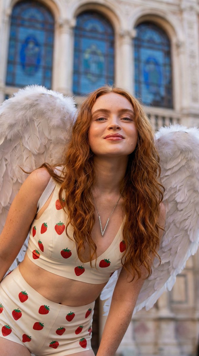 Low-Angle Portrait of Woman with Angel Wings and Cherry Pajamas 3