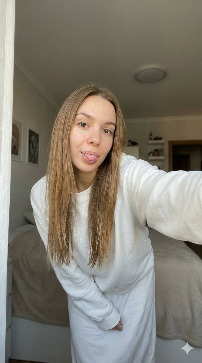 Candid Smartphone Selfie with Playful Expression 1