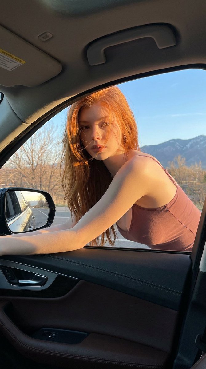 Red-Haired Woman Car Portrait 2